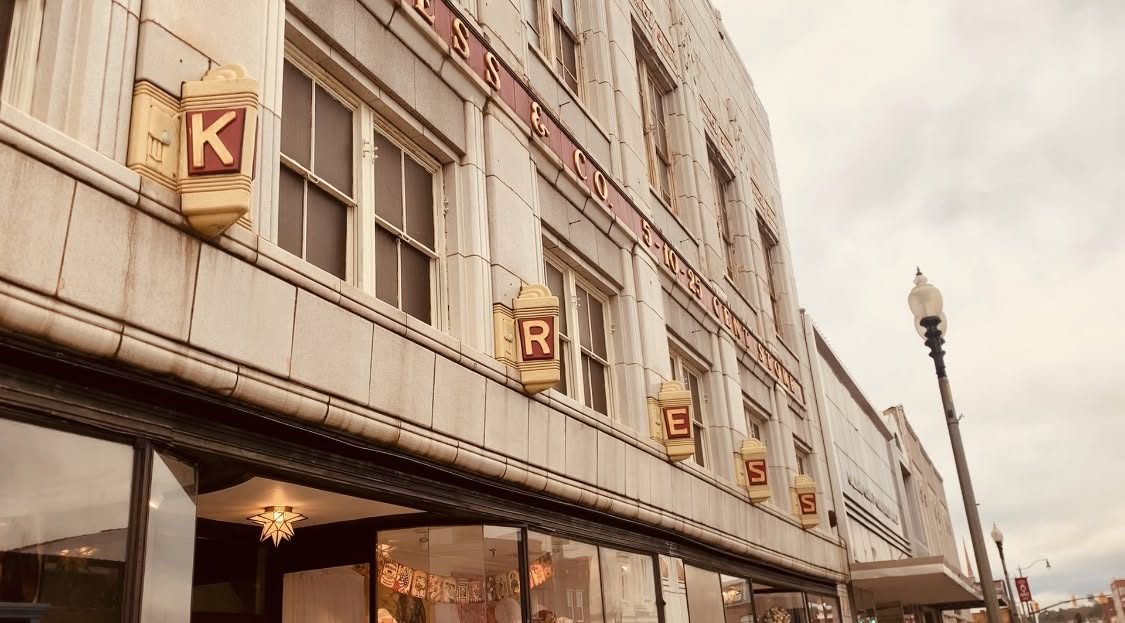 The Kress building today, with its lit KRESS sign